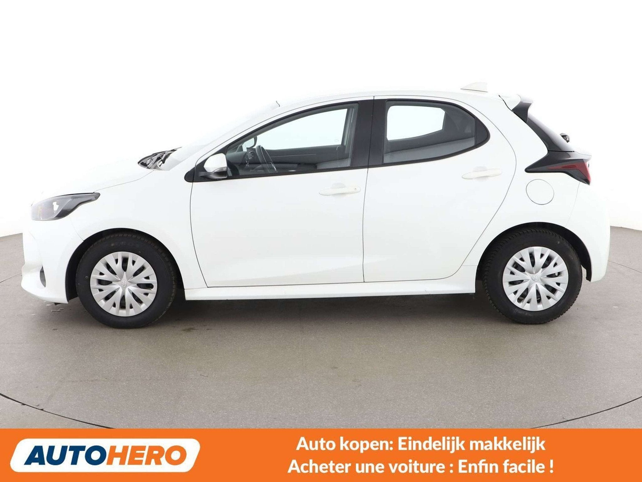 Toyota Yaris 1.5 Hybrid Comfort (bj 2021, automaat), Stof, Gebruikt, Wit, 1490 cc
