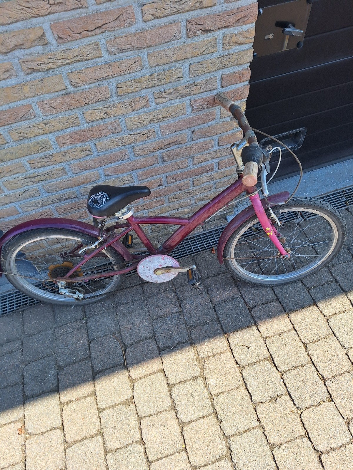 Kinderfietsje rood, Ophalen