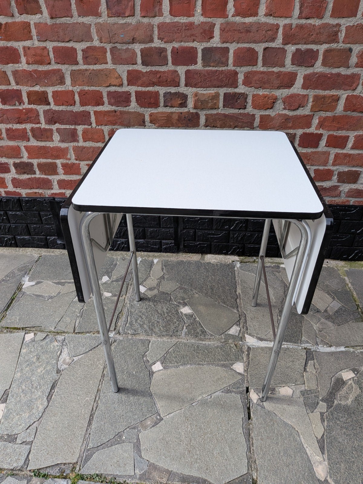 Formica plooitafel, Ophalen