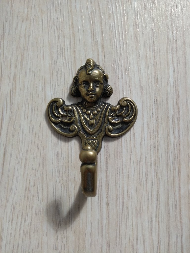 koperen kleerhanger (kapstok) in de vorm van een engel, Ophalen