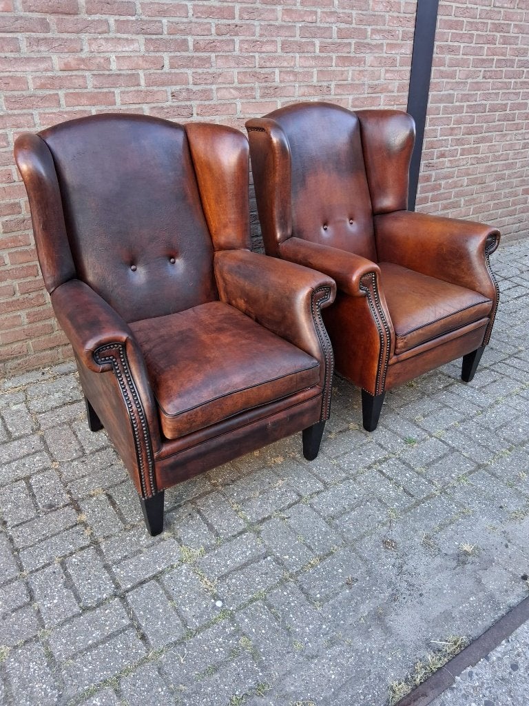 Twee authentieke oorfauteuils schapenleer., Huis en Inrichting, Ophalen, Gebruikt, 75 tot 100 cm, Engels