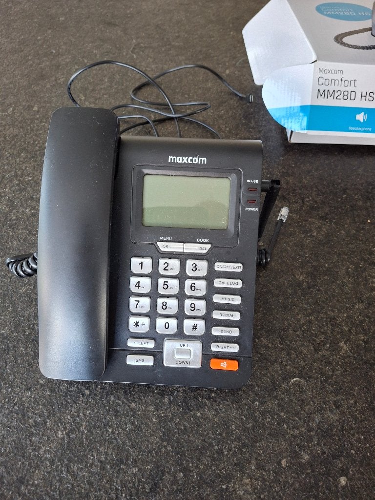 Vast telefoontoestel Maxcom met simkaart, Ophalen