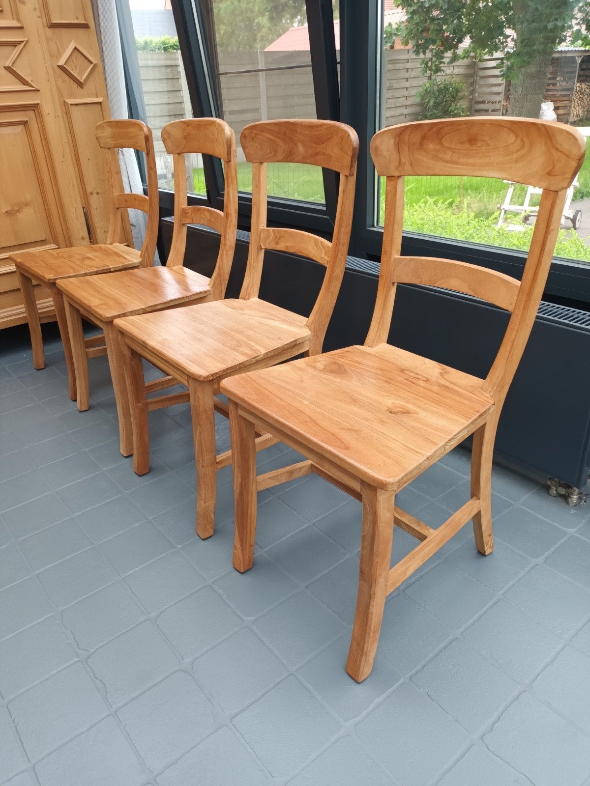 Eetkamerstoelen in teak, Ophalen