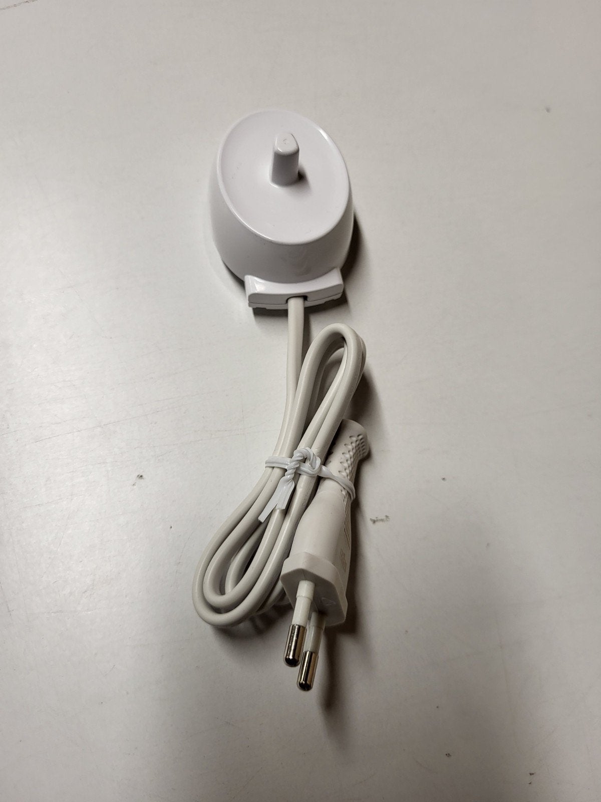 Lader oral-b toestel, Enlèvement