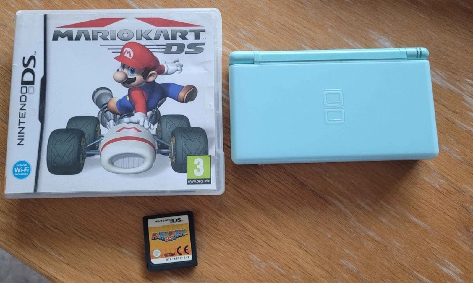 Nintendo DS Lite - 2 Mario games, Enlèvement, Utilisé, Bleu, Avec jeux