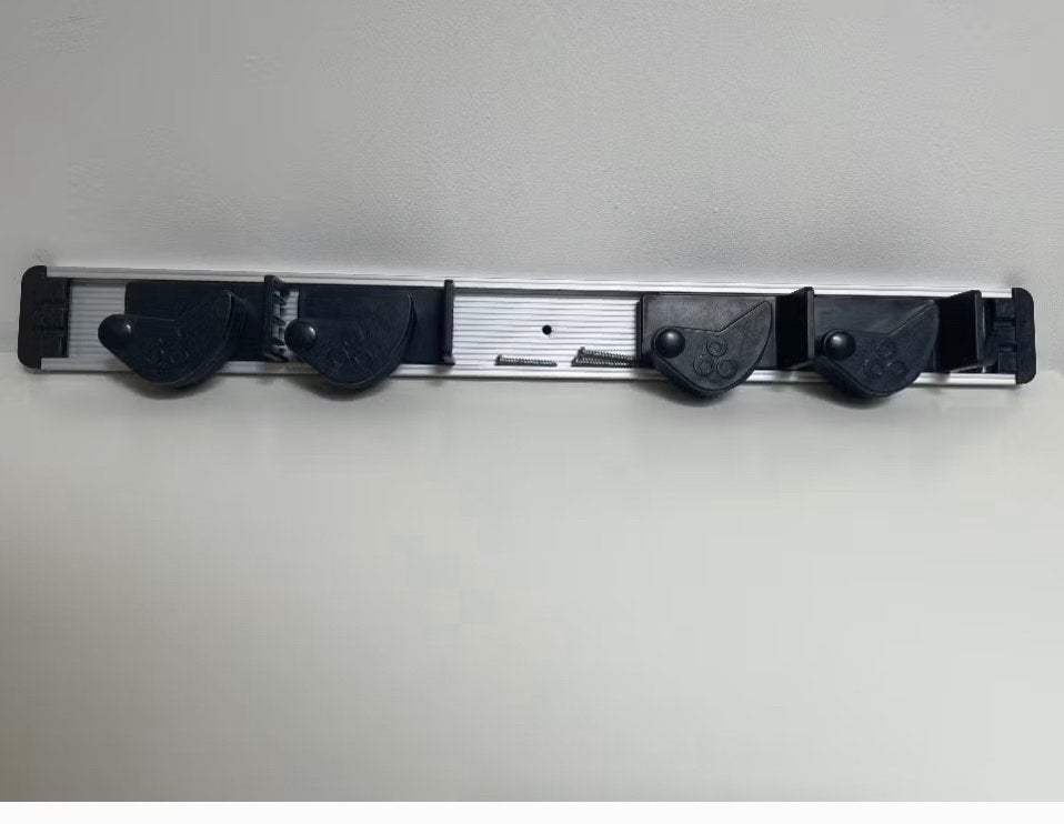 Wandhouder / bezemhouder met 4 klemmen, Enlèvement, Utilisé