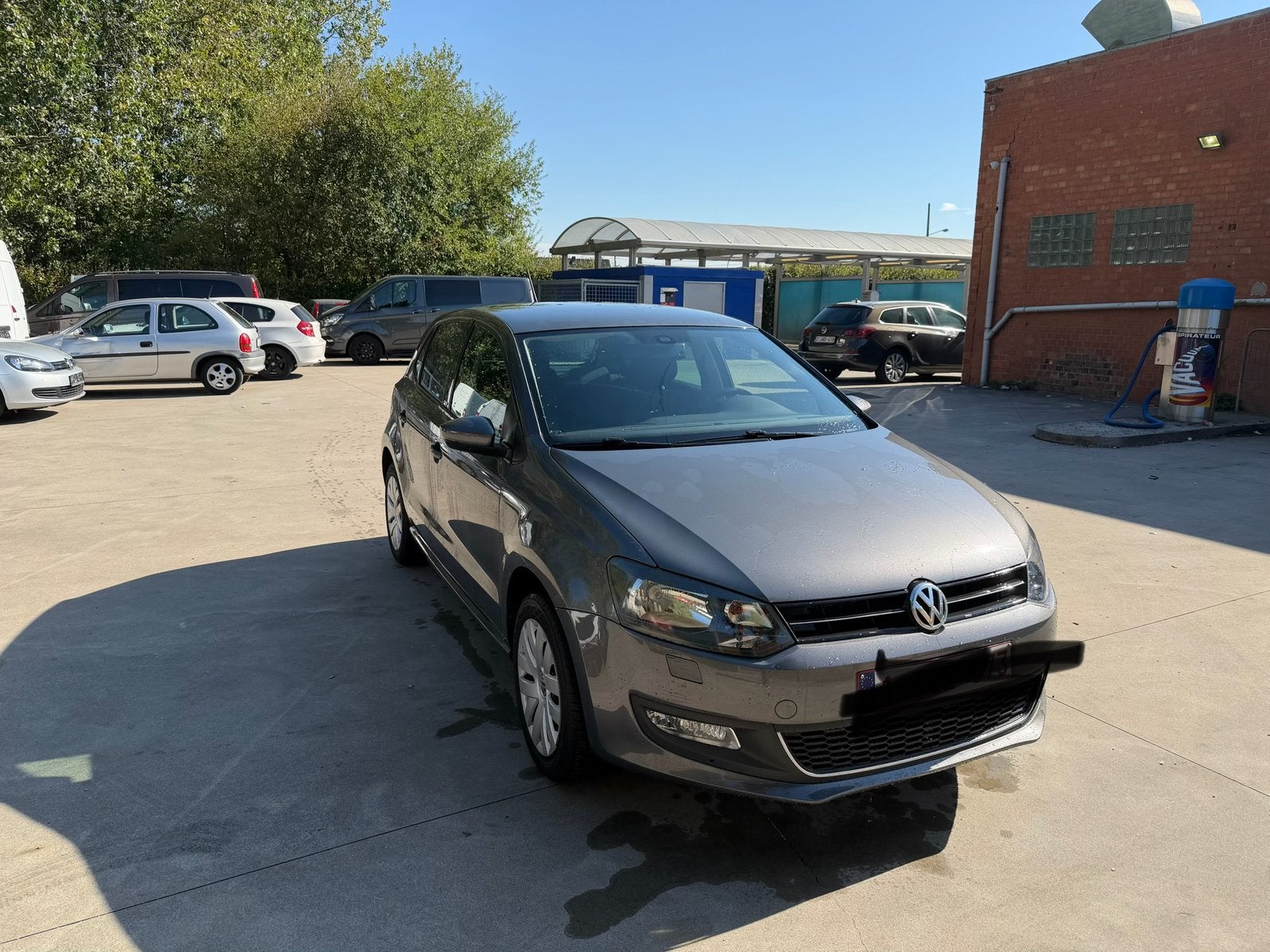 Volkswagen polo 1.2 benzine bluemotion style met garantie, Auto's, Voorwielaandrijving, Euro 5, Stof, Zwart