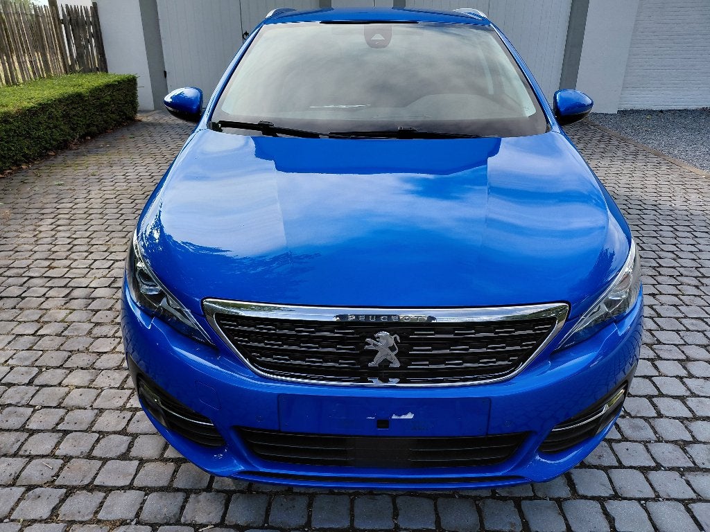 Peugeot 308 SW1.3 130 pk automaat, Auto's, Dealer onderhouden, 1199 cc, Blauw, Leder en Stof