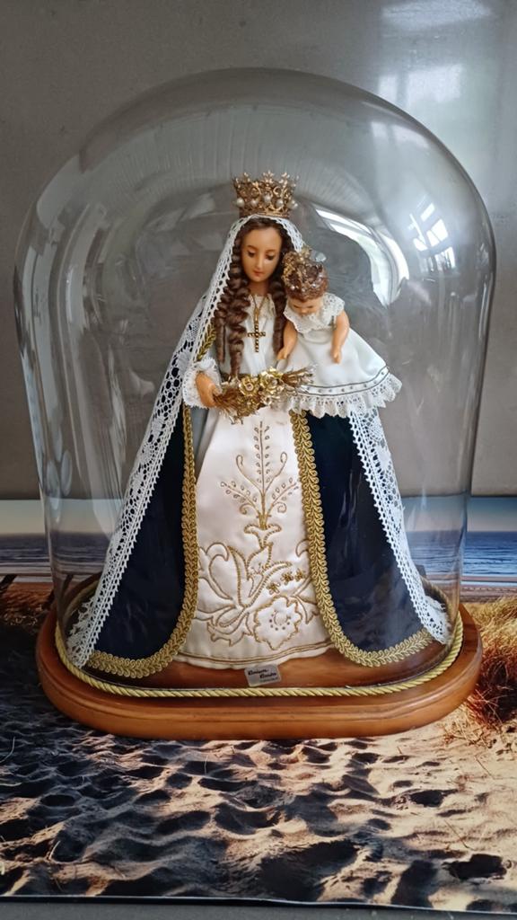 Religieus beeld onder stolp, Ophalen