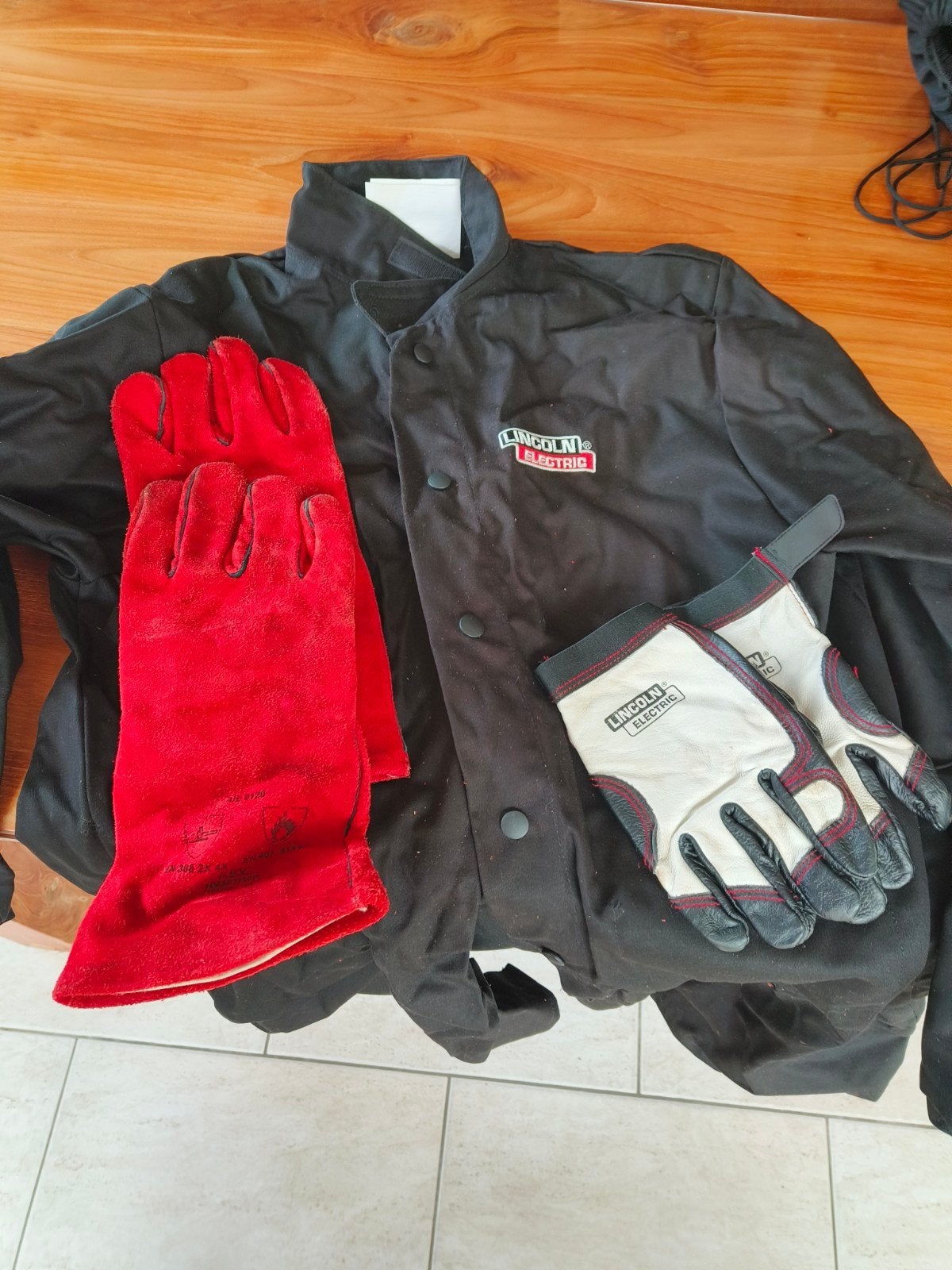 Lassen, beschermende stofjas en handschoenen Lincoln elec, Bricolage & Construction, Enlèvement