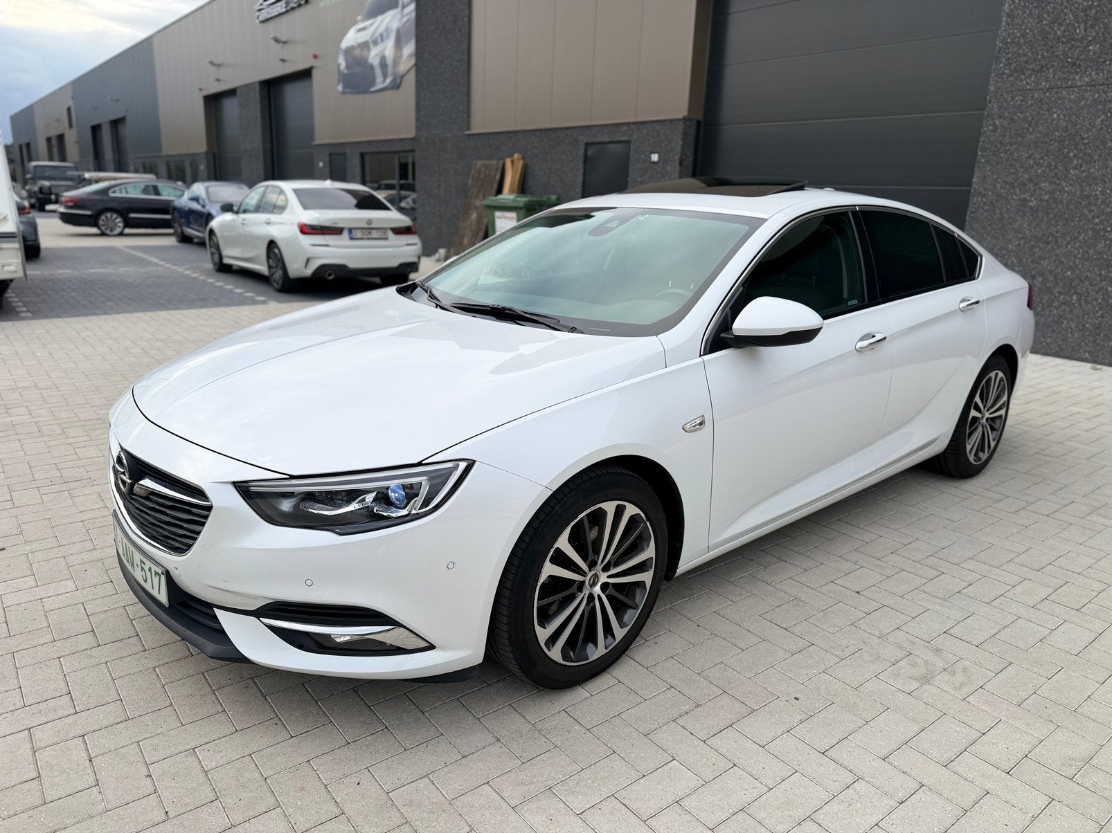 Opel Insignia Grand Sport 2017 1.5 Benzine 165pk Manueel, Auto's, Voorwielaandrijving, 4 cilinders, Wit, Leder