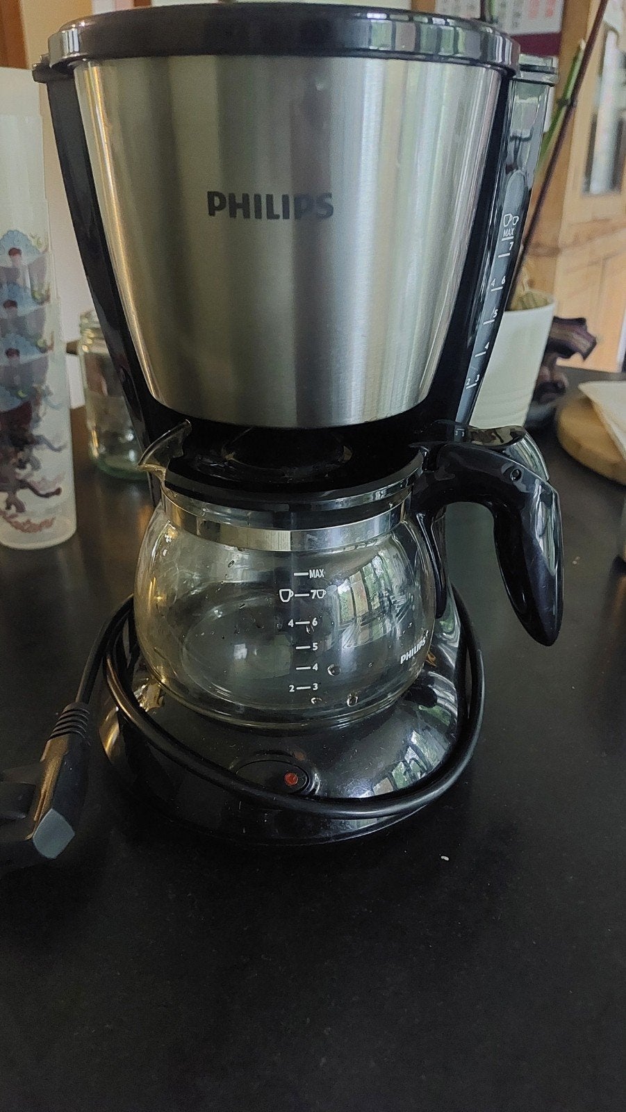Petite cafetière Philips, Enlèvement