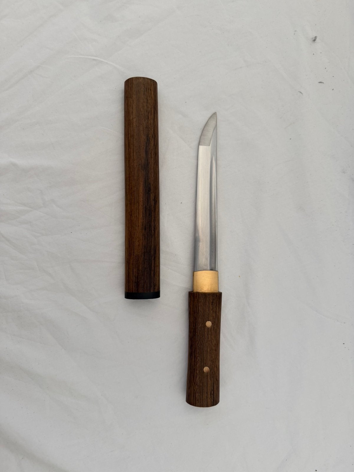 Japanse tanto van rozenhout, Ophalen