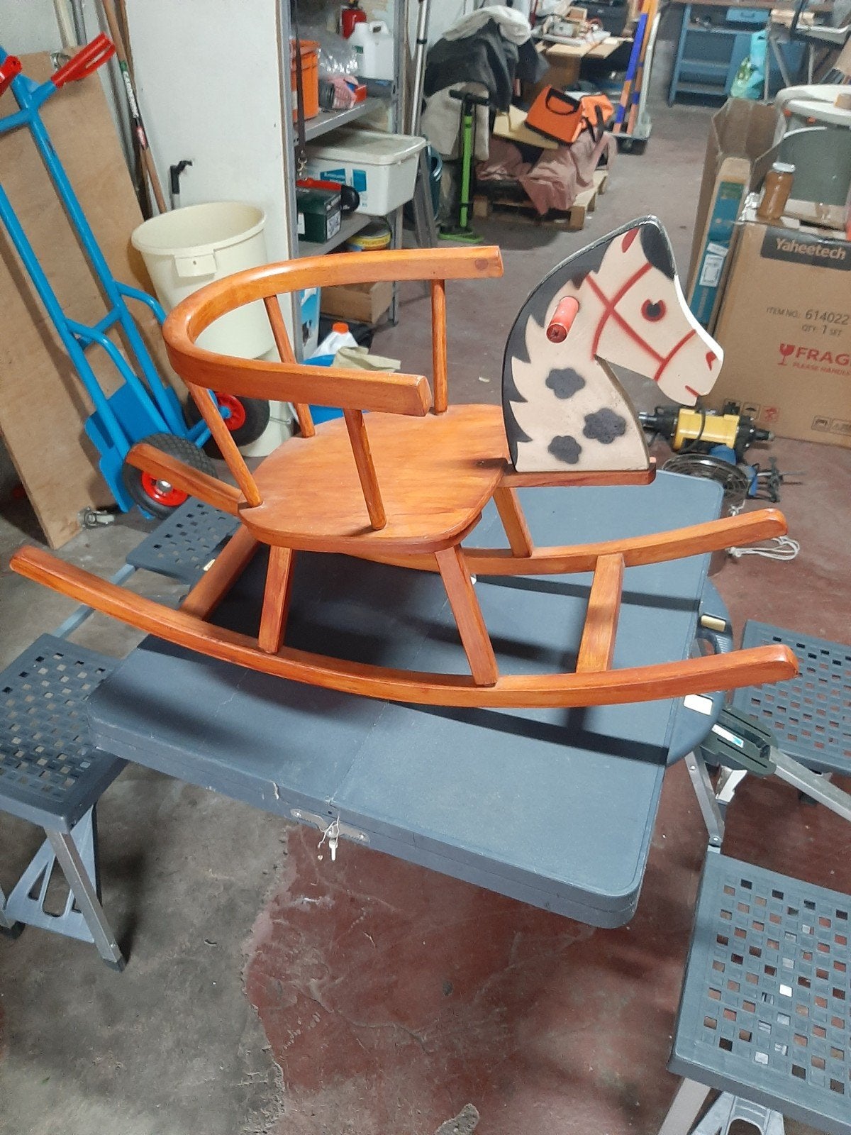 retro schommelpaard, Ophalen