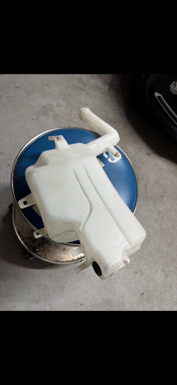 Réservoir lave glace mazda 2, Enlèvement