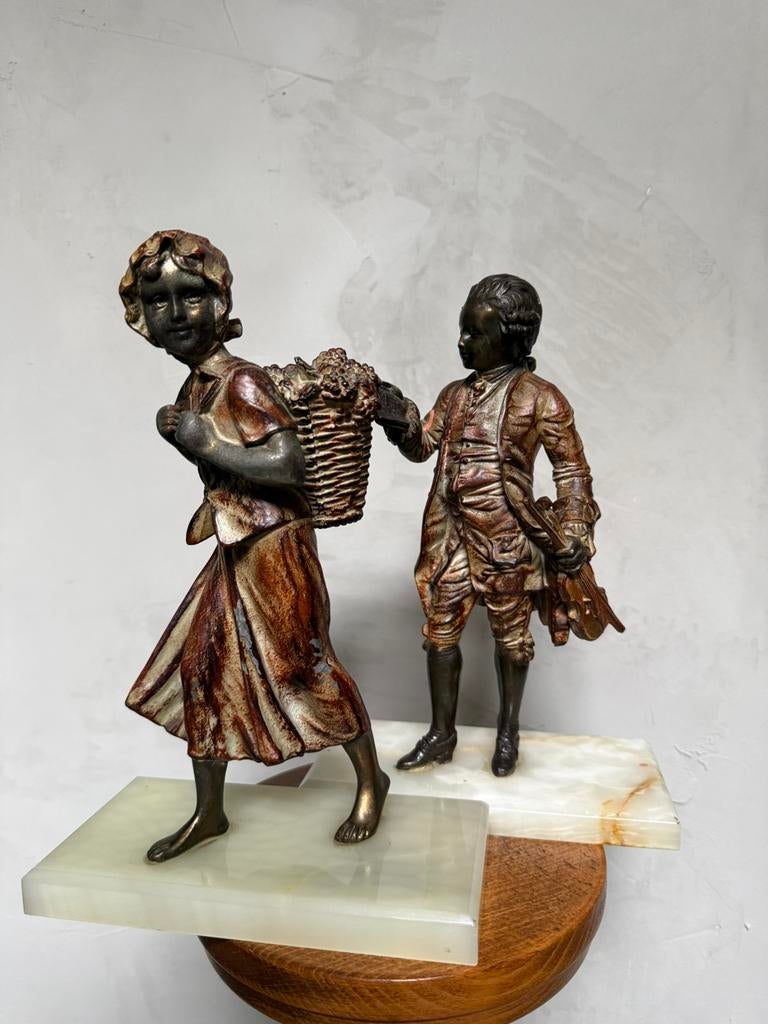 2x art deco beeldjes Mozart druivenplukster, Ophalen