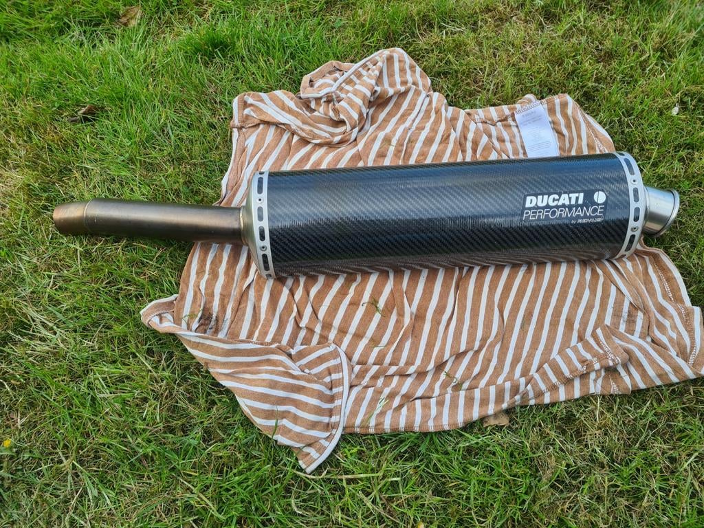Ducatie carbon demper / universele demper (links) zgan!, Motoren, Ophalen of Verzenden