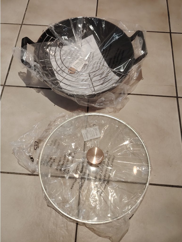 Wok Cast Iron, Enlèvement