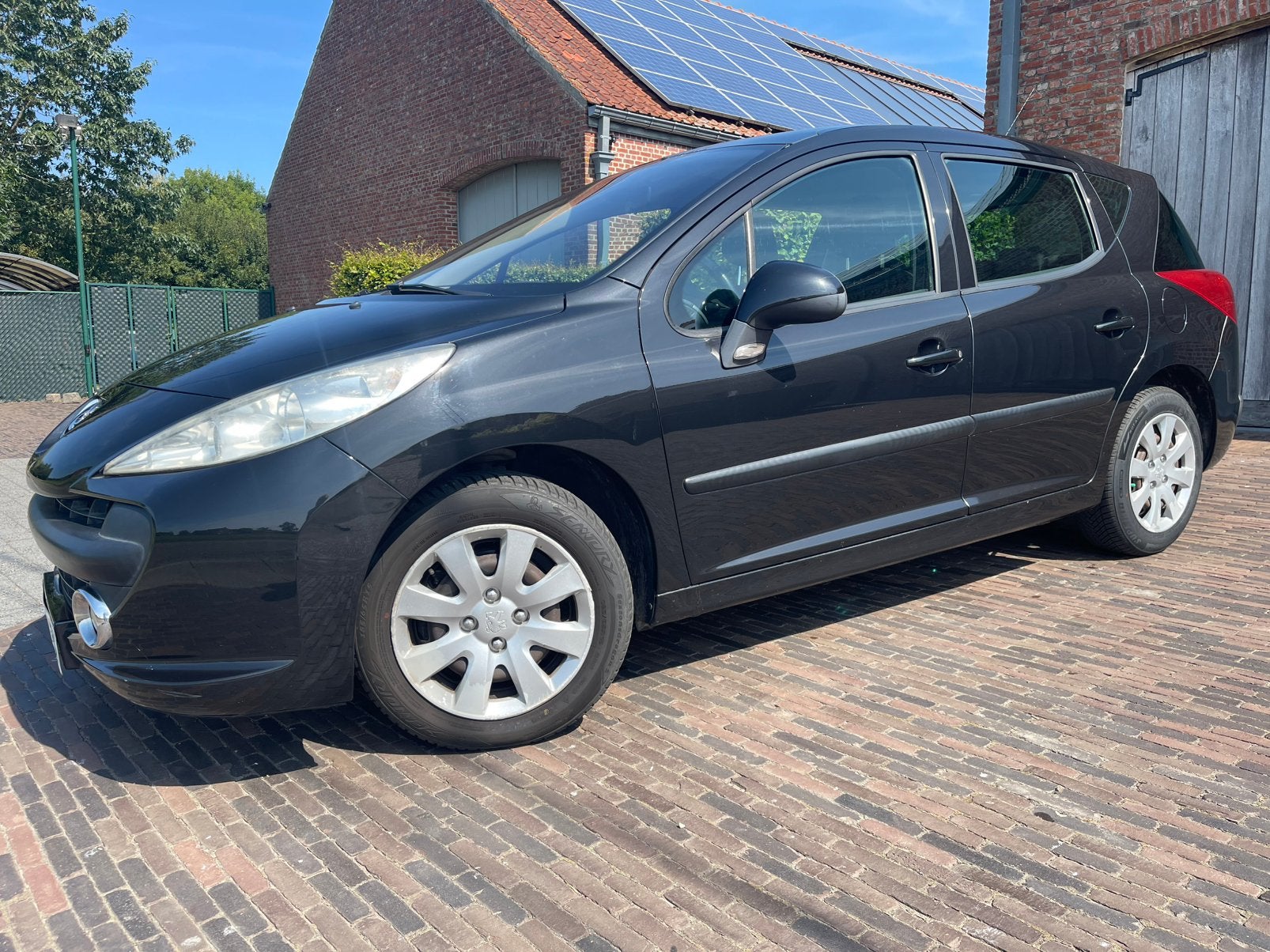 207 SW 1.4i Panodak/AIRCO!!!!!!, Auto's, Stof, Zwart, 4 cilinders, Zwart