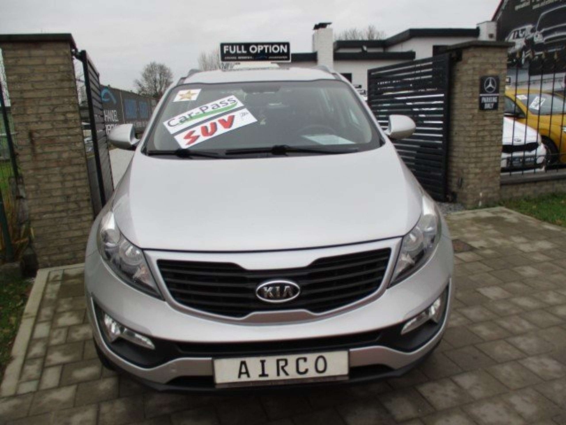 Kia Sportage 1.6i 2WD DYNAMIQUE ISG AIRCO ALU PDC TOPSTAAT 1, Auto's, Stof, Gebruikt, 149 g/km, Bedrijf