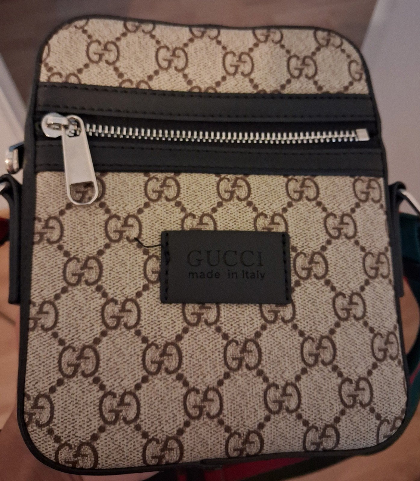 Gucci tas, Ophalen
