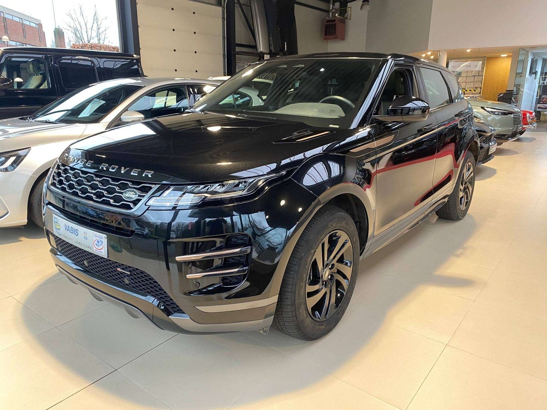 Land Rover Range Rover Evoque Evoque 1.5 PHEV 4WD P300E R-Dy, Auto's, Gebruikt, 4 cilinders, Zwart, Plug-in hybride