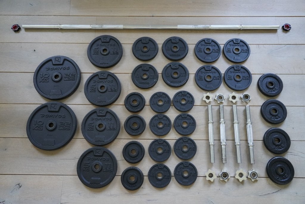 79 kg halterschijven + 4 dumbbellstangen + halterstang, Sport en Fitness, Ophalen, Gebruikt, Armen, Halterset