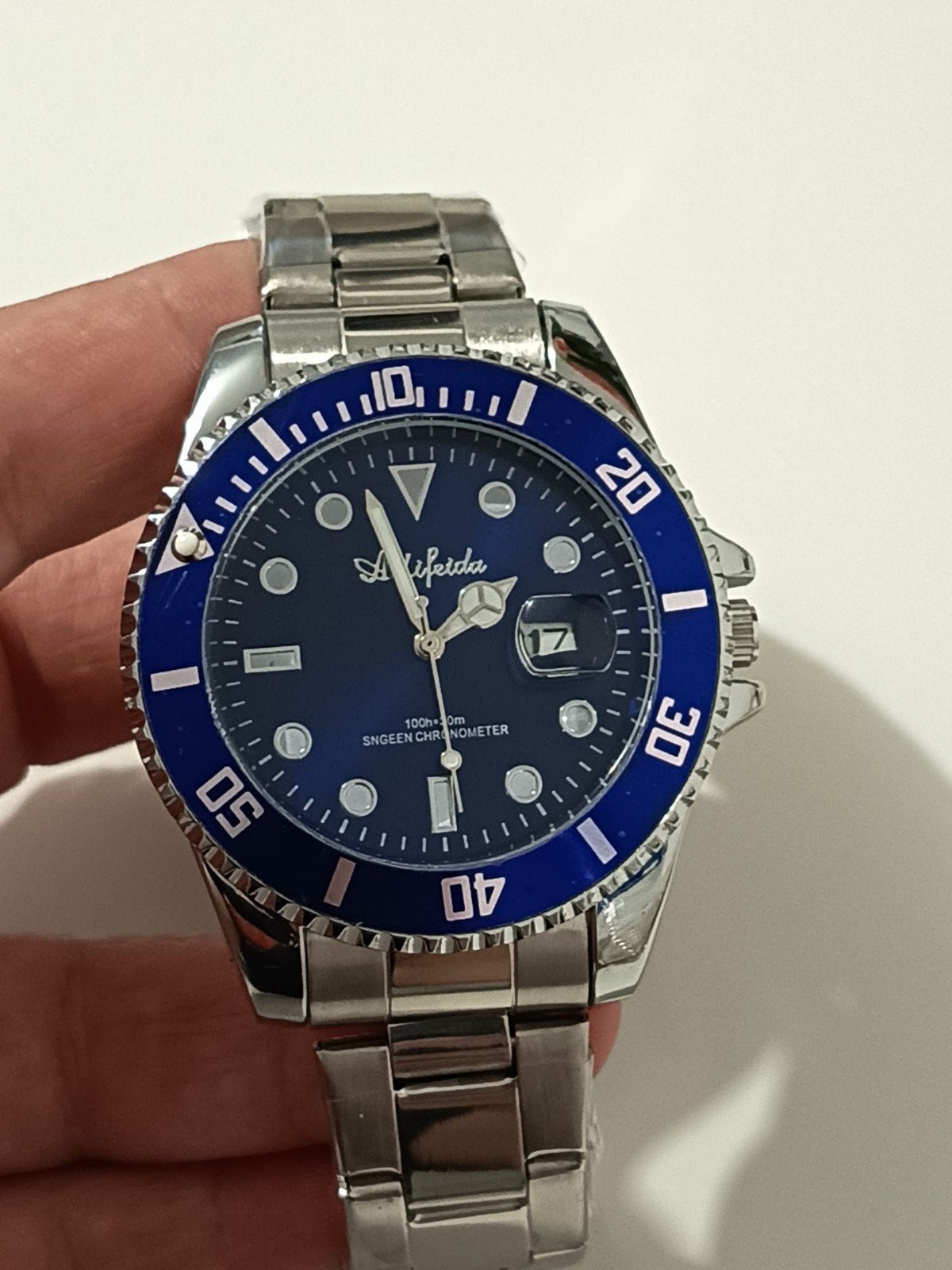 montre automatique bleue, Envoi, Bleu