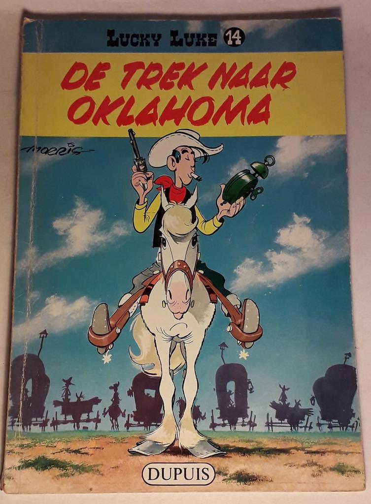 Lucky Luke 14: De trek naar Oklahoma - 1960 (1ste druk), Ophalen of Verzenden, Zo goed als nieuw