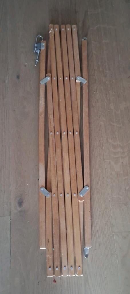 Veiligheidshek hout voor kindjes, Ophalen
