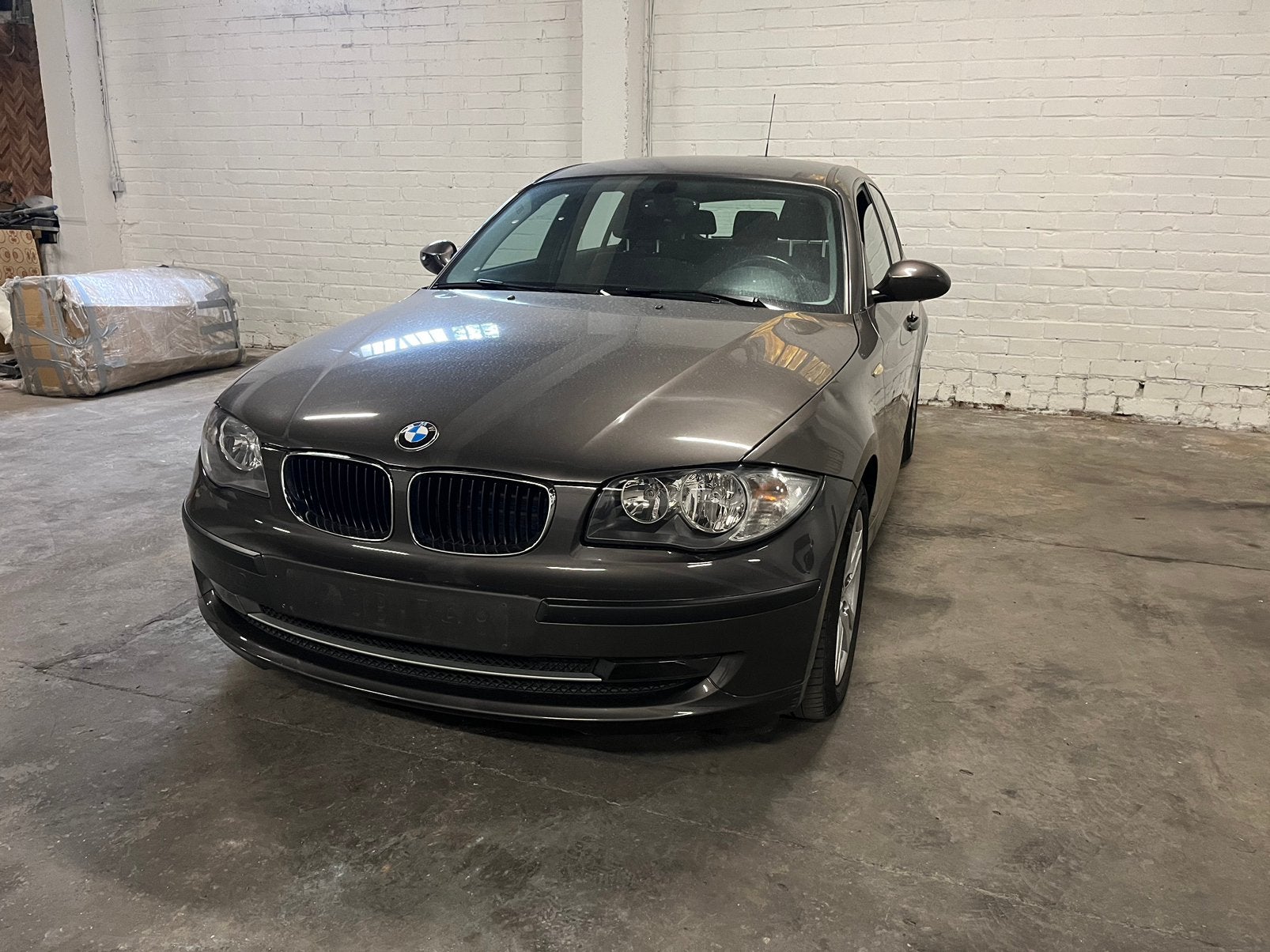 BMW 116i manueel benzine 5deurs, Auto's, BMW, 90 kW, 139 g/km, Bruin, 5 deurs