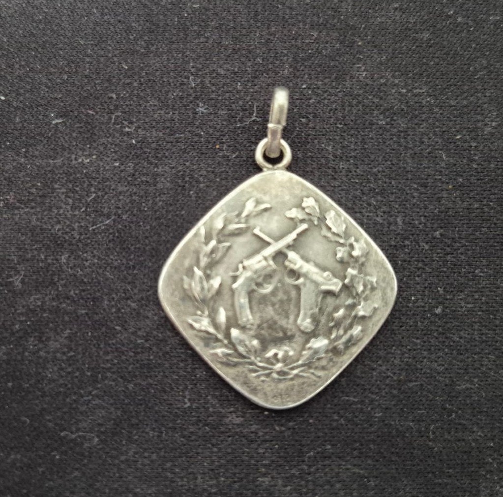 Zilveren schietwedstrijdmedaille, Enlèvement
