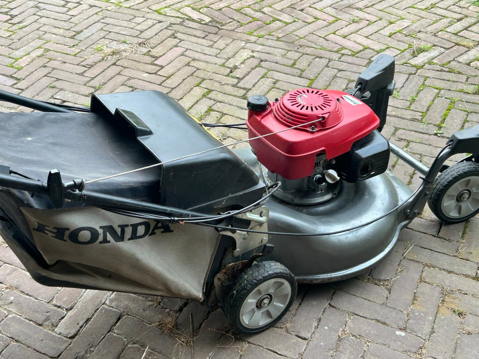 Honda grasmaaier zelftrekker, Ophalen, Zo goed als nieuw, Opvangbak