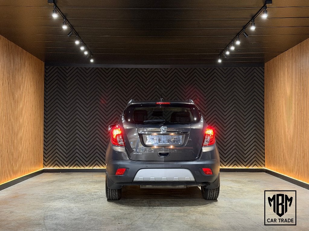 ✅Opel Mokka 1.6i GARANTIE Airco Navi CruiseC Parksensor 1Eig, Auto's, Dealer onderhouden, Stof, 4 cilinders, 5 deurs