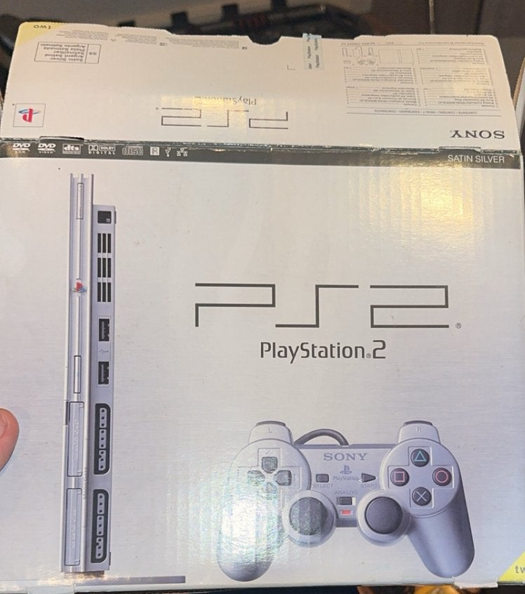 PS2 Slim Argentée + 2 manettes + grosse collection jeux, Games en Spelcomputers, Spelcomputers | Sony PlayStation 2, Gebruikt