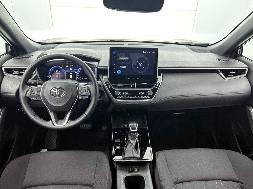 Toyota Corolla Cross 1.8 Hybrid Style | Achteruitrijcamera |, Auto's, Stof, Gebruikt, 750 kg, 4 cilinders