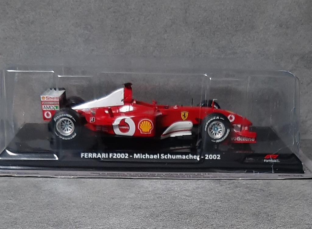 1:24/Michael Schumacher/Ferrari F2002, Hobby & Loisirs créatifs, Voitures miniatures | 1:24, Enlèvement ou Envoi, Comme neuf, Voiture