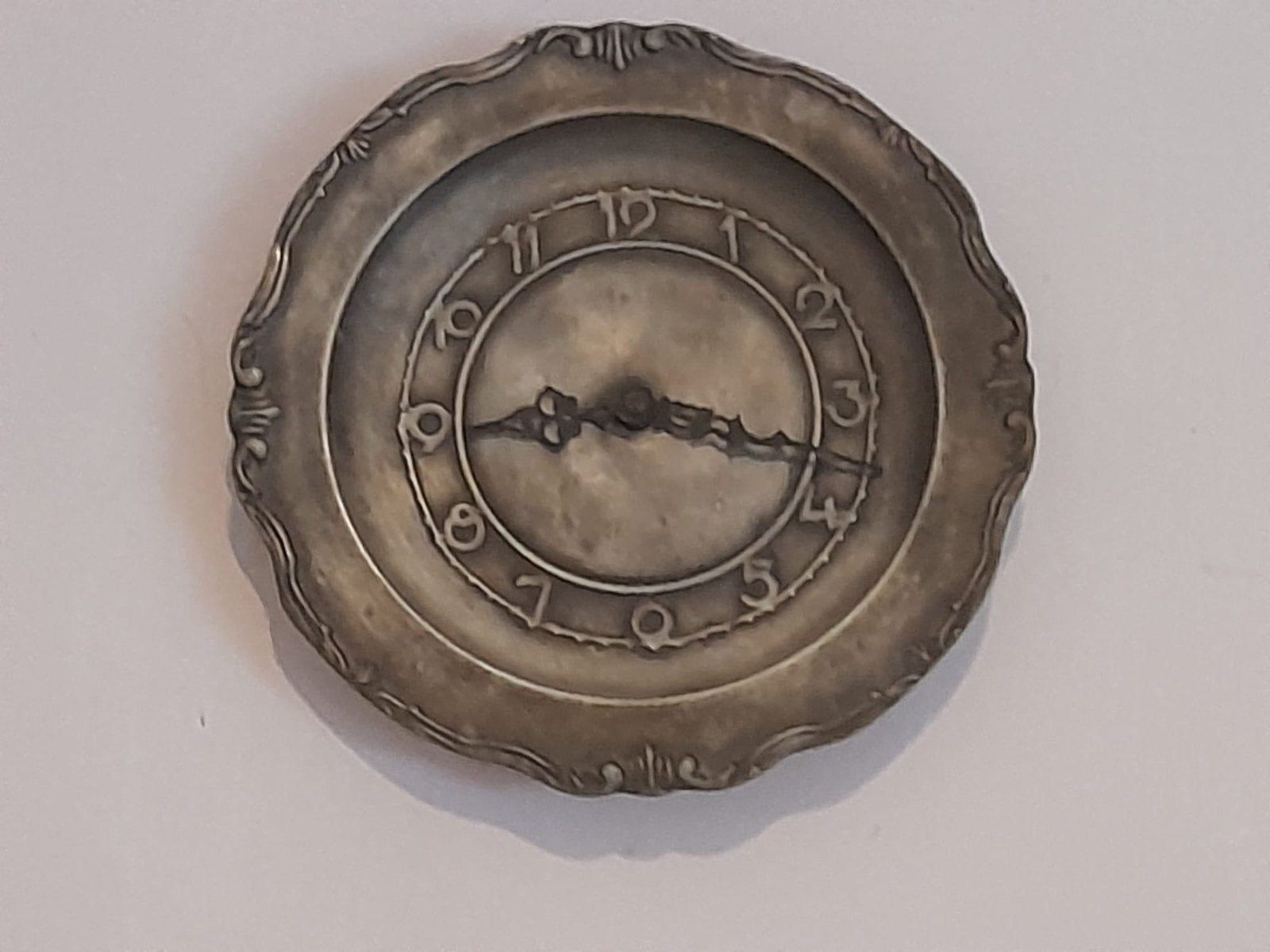 Horloge etain, Enlèvement, Autres matériaux