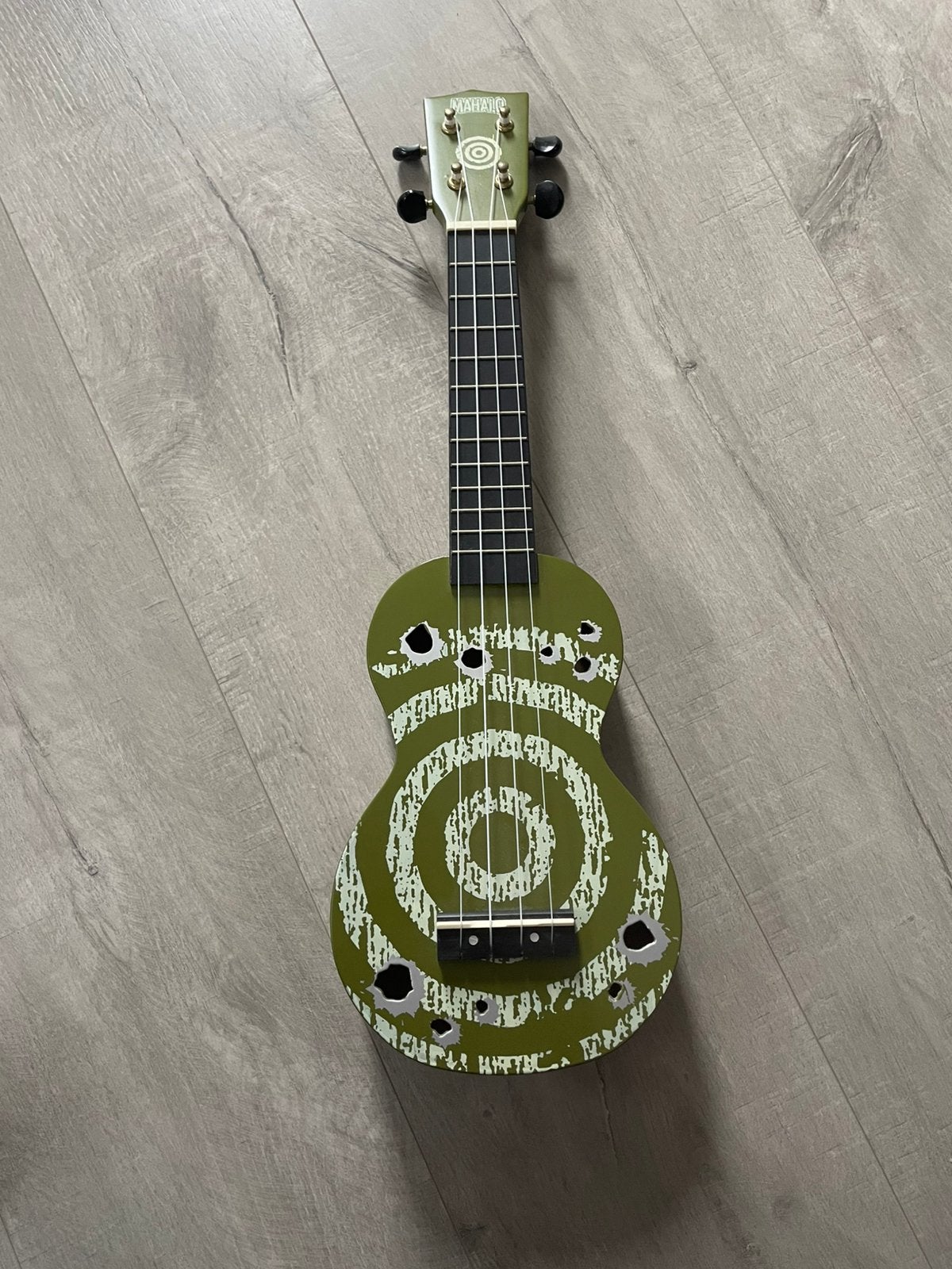 ukelele zo goed al nieuw, Ophalen, Zo goed als nieuw