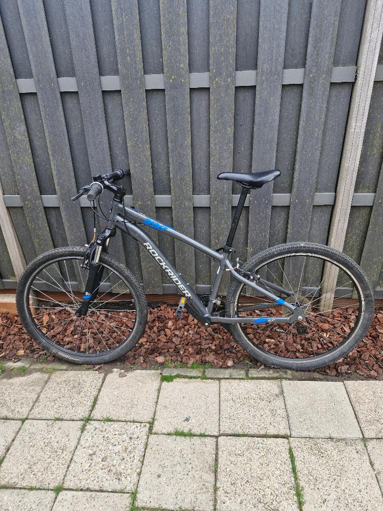 Rockrider ST100 met 27,5 inch wielen, Fietsen en Brommers, Fietsen | Mountainbikes en ATB, Gebruikt, Heren, Schijfrem, Ophalen
