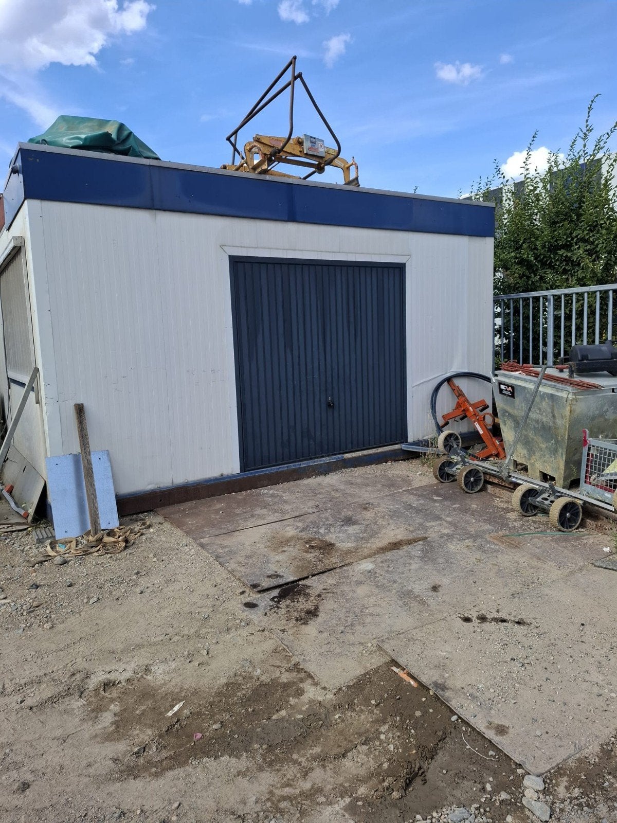 werf/wooncontainer, Enlèvement