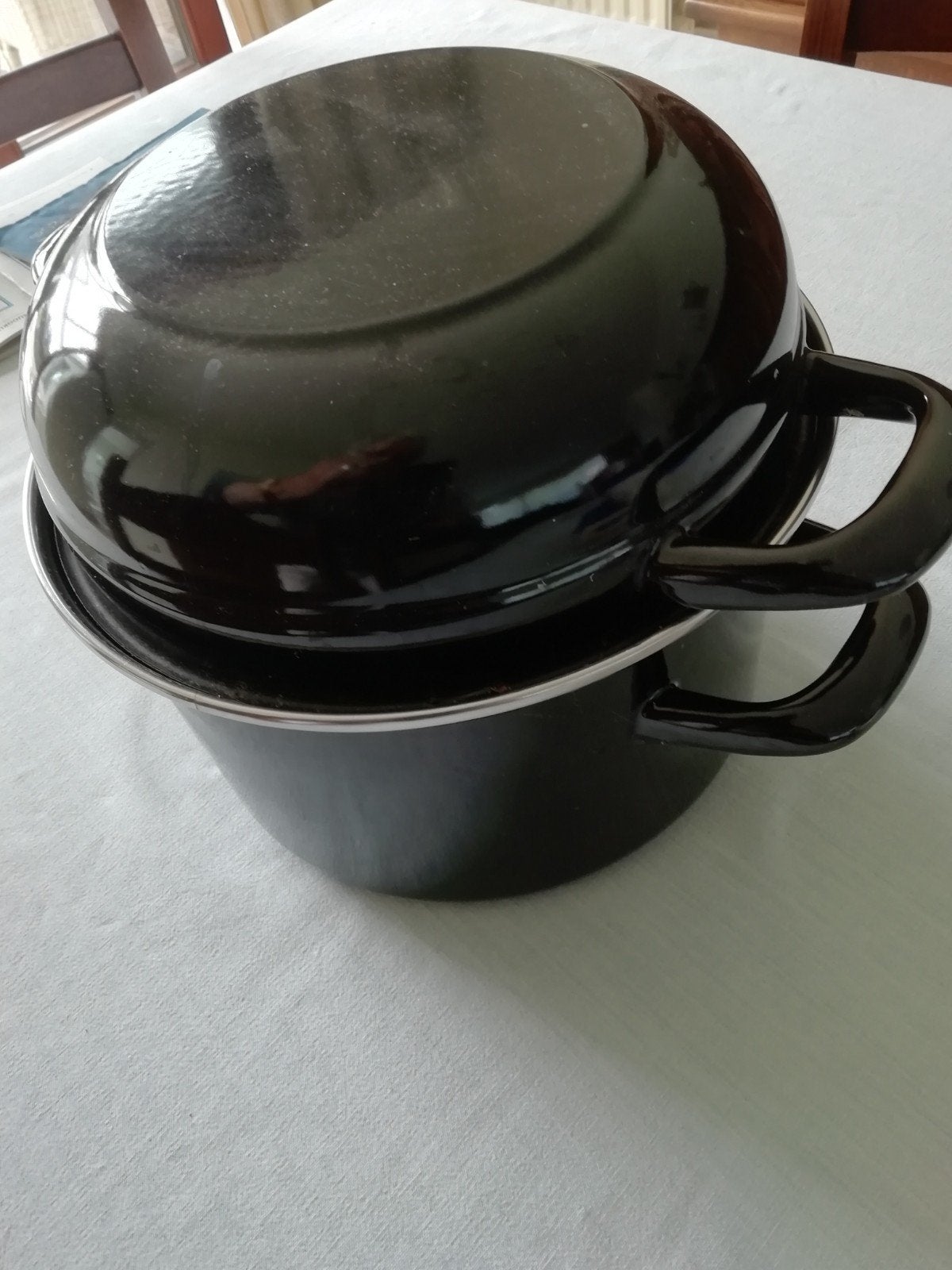 mosselpot, Enlèvement