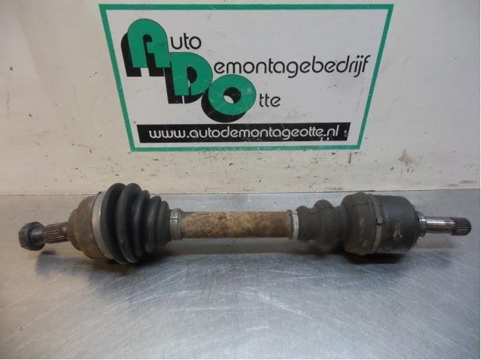 Arbre de transmission avant gauche d'un Peugeot Partner (Par, -, 3 mois de garantie, Utilisé, -