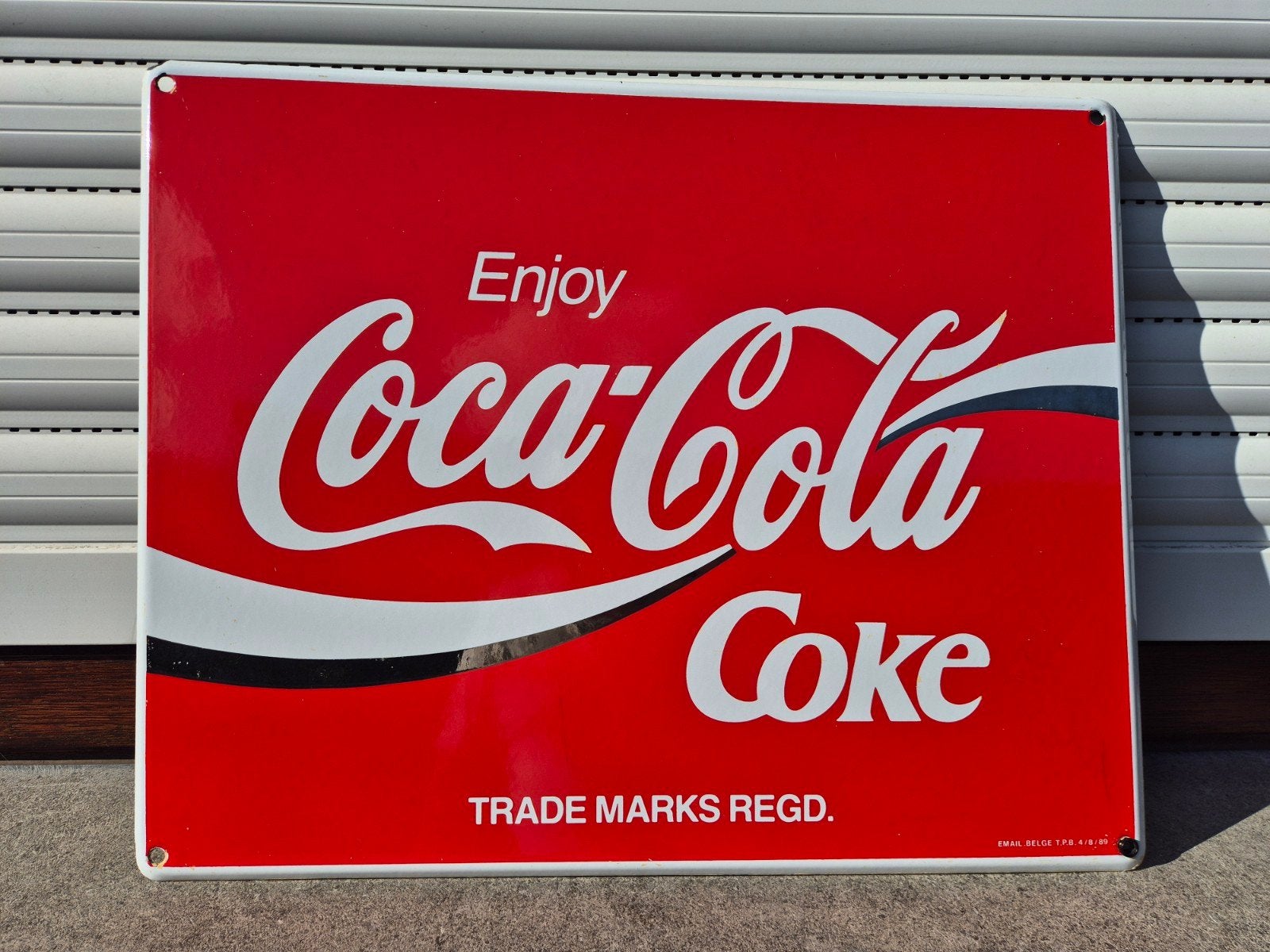 Coca-Cola emaille bord uit 1989, Ophalen