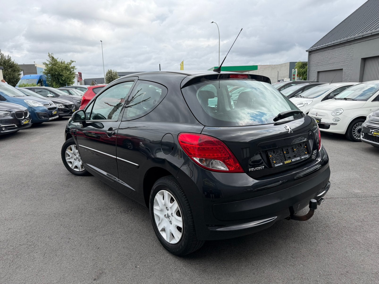 Peugeot 207 1.4i | Airco | Gps | 74.266km | GARANTIE |, Auto's, Euro 5, Stof, Zwart, 1397 cc