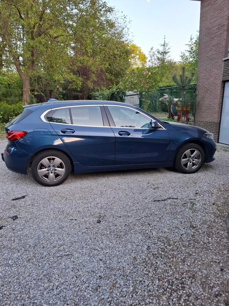 Bmw 116i  met 3 jaar garantie Bmw premium selection, Blauw, Bedrijf, 3 cilinders, Onderhoudsboekje