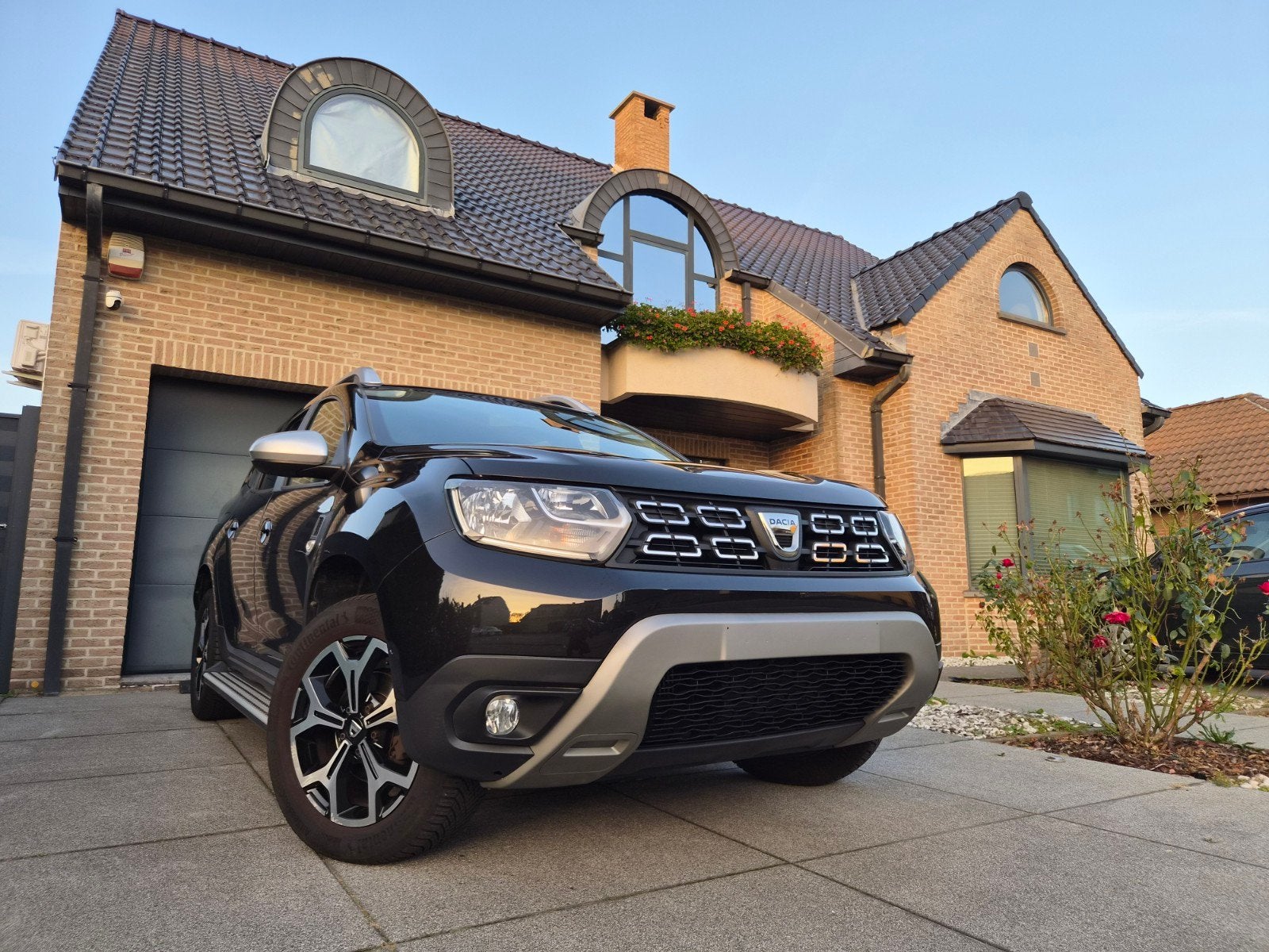 Dacia Duster 1.3 TCe Rainbow * CRUISE / CAMERA / NAVI *, Auto's, Euro 6, Duster, Zwart, Verwarmde buitenspiegels