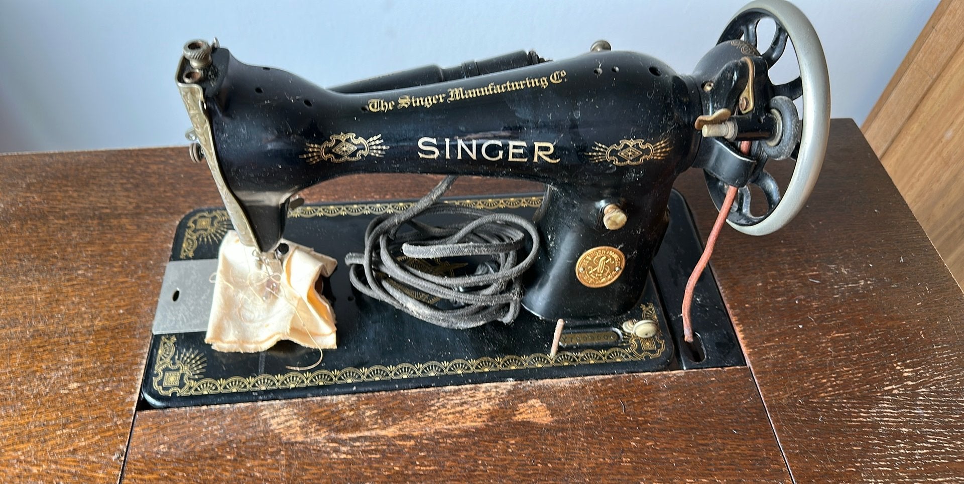 Machine à coudre Singer ancienne, Enlèvement