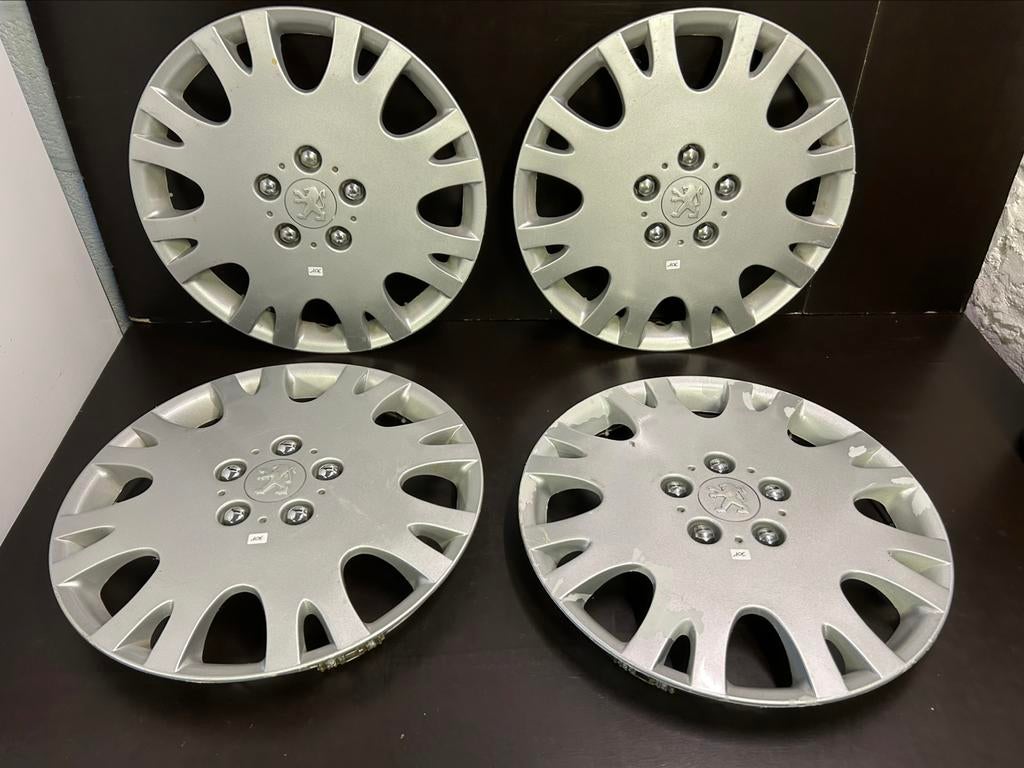 4 wieldoppen Peugeot 207,208,307,308,2008, partner 16", Auto diversen, Wieldoppen, Ophalen of Verzenden, Gebruikt