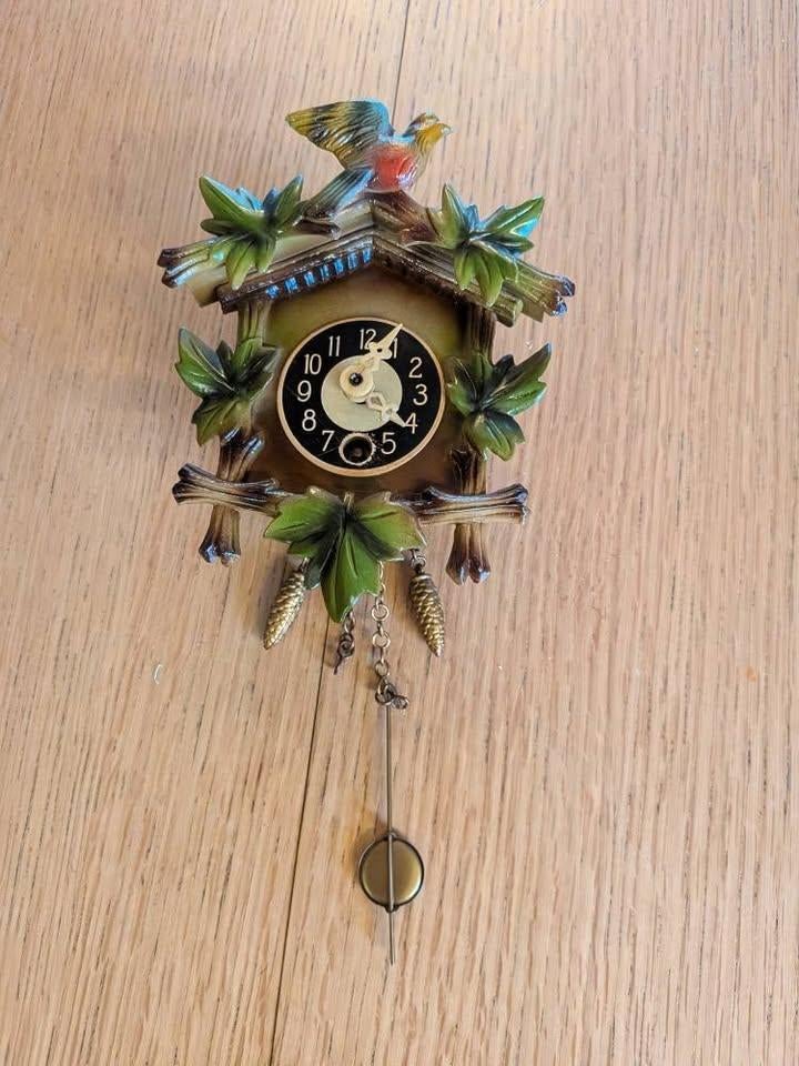 Duitse kleurrijke fantasie mini-koekoeksklok, Ophalen